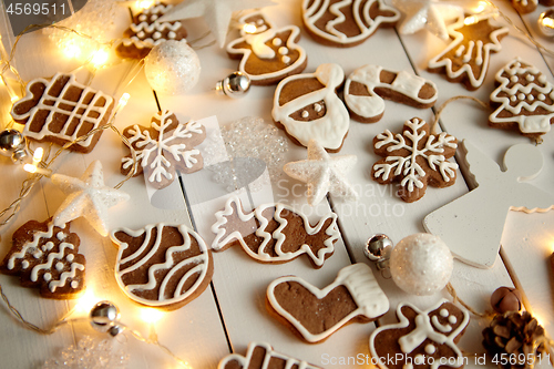 Image of Christmas sweets composition. Gingerbread cookies with xmas decorations