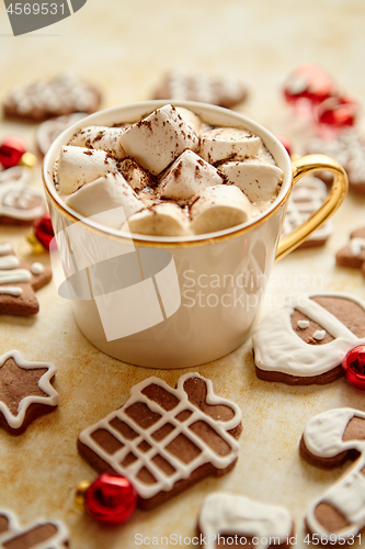 Image of Cup of hot chocolate and Christmas shaped gingerbread cookies