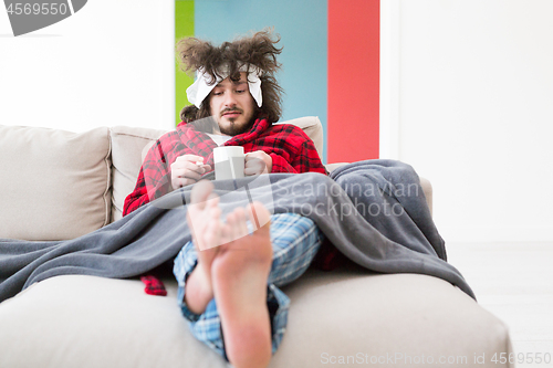 Image of young Man with flu and fever