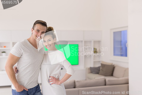 Image of couple hugging in their new home