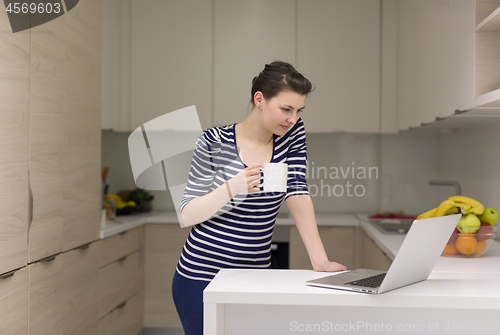 Image of woman drinking coffee enjoying relaxing lifestyle