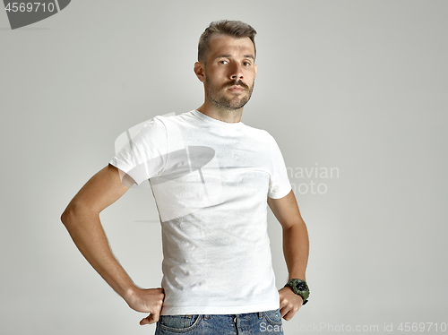 Image of The sad and serious man at studio- portrait