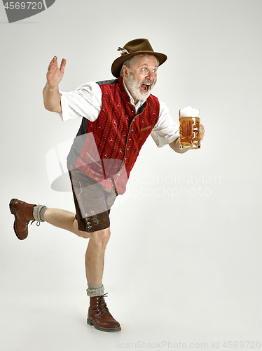 Image of Portrait of Oktoberfest man, wearing a traditional Bavarian clothes