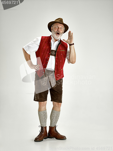 Image of Portrait of Oktoberfest man, wearing a traditional Bavarian clothes