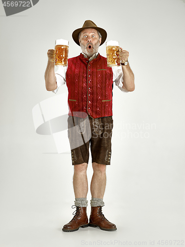 Image of Portrait of Oktoberfest man, wearing a traditional Bavarian clothes