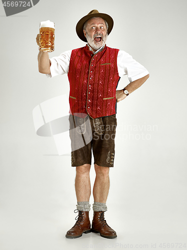 Image of Portrait of Oktoberfest man, wearing a traditional Bavarian clothes