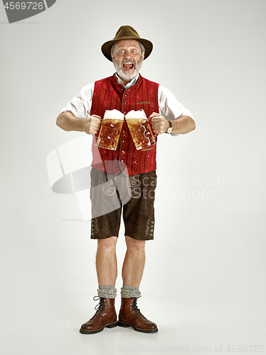 Image of Portrait of Oktoberfest man, wearing a traditional Bavarian clothes