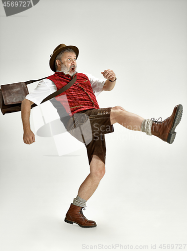 Image of Portrait of Oktoberfest man, wearing a traditional Bavarian clothes