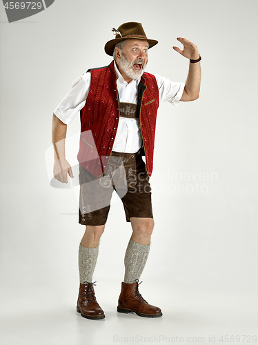 Image of Portrait of Oktoberfest man, wearing a traditional Bavarian clothes