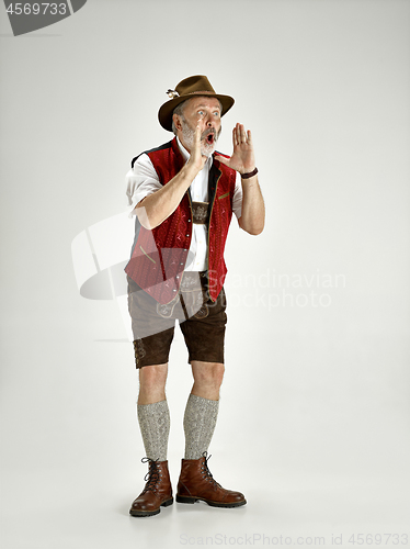 Image of Portrait of Oktoberfest man, wearing a traditional Bavarian clothes