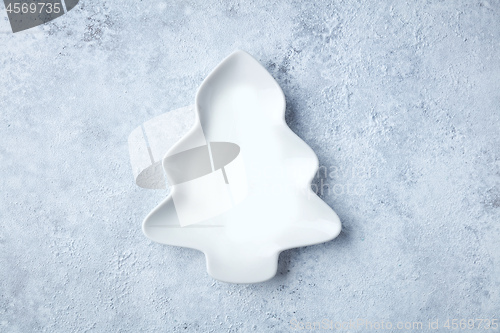 Image of empty white bowl on painted background