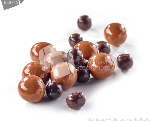 Image of chocolate balls on white background