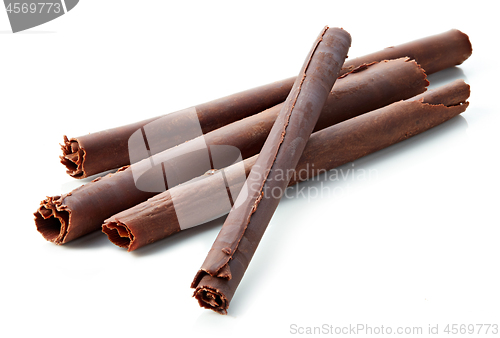 Image of chocolate sticks on white background