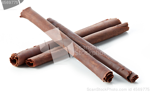 Image of chocolate sticks on white background