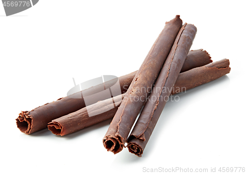 Image of chocolate sticks on white background