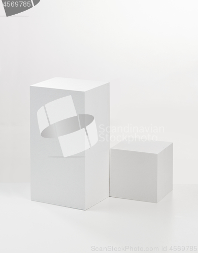 Image of two white cubes