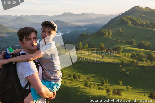 Image of Happy father and son in the Altai mountains