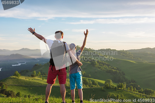 Image of Happy father and son in the Altai mountains