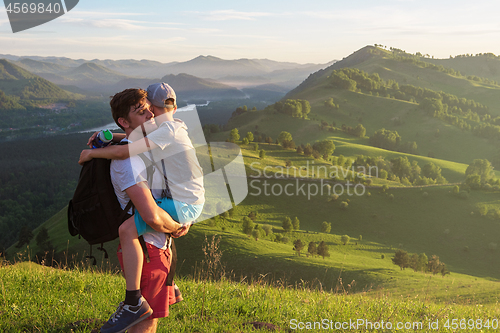 Image of Happy father and son in the Altai mountains