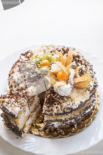 Image of cake with walnuts and physalis