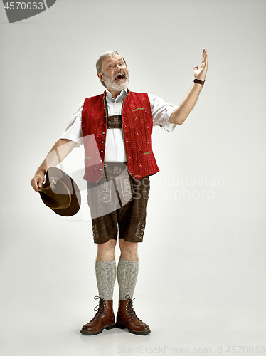 Image of Portrait of Oktoberfest man, wearing a traditional Bavarian clothes