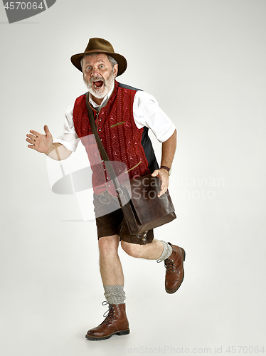 Image of Portrait of Oktoberfest man, wearing a traditional Bavarian clothes