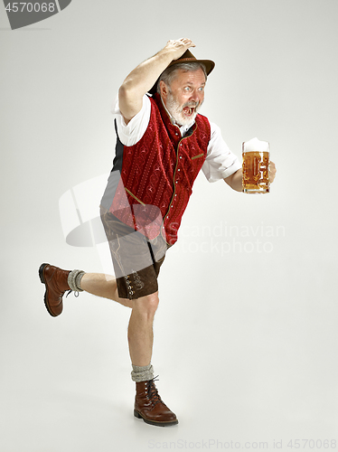 Image of Portrait of Oktoberfest man, wearing a traditional Bavarian clothes