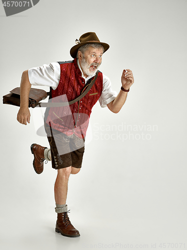 Image of Portrait of Oktoberfest man, wearing a traditional Bavarian clothes