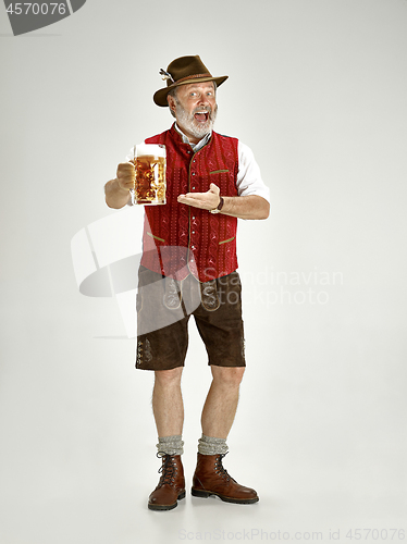 Image of Portrait of Oktoberfest man, wearing a traditional Bavarian clothes