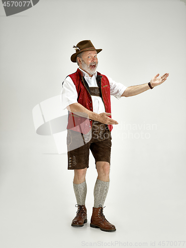 Image of Portrait of Oktoberfest man, wearing a traditional Bavarian clothes