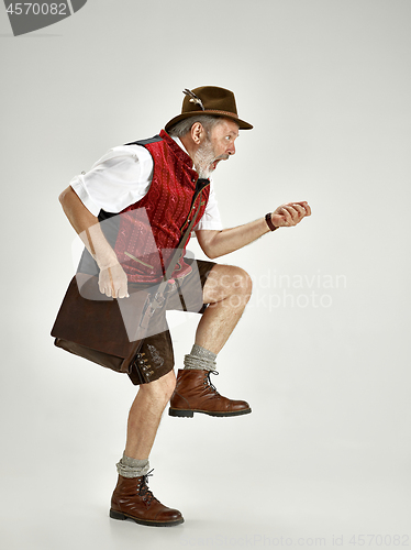 Image of Portrait of Oktoberfest man, wearing a traditional Bavarian clothes