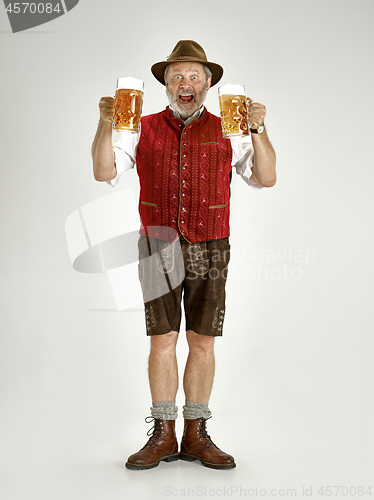 Image of Portrait of Oktoberfest man, wearing a traditional Bavarian clothes