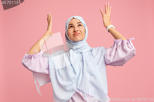 Image of Argue, arguing concept. arab woman in hijab. Portrait of girl, posing at studio background