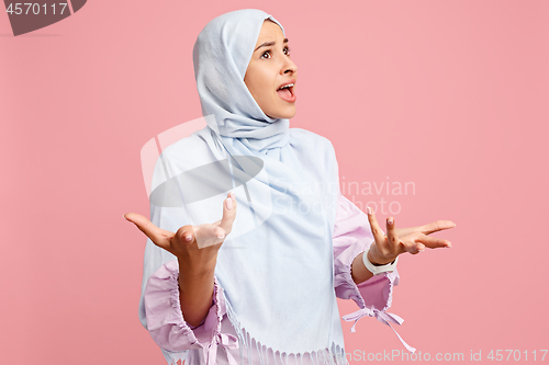 Image of Argue, arguing concept. arab woman in hijab. Portrait of girl, posing at studio background