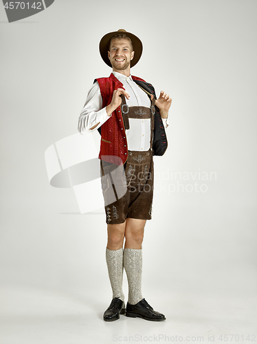 Image of Portrait of Oktoberfest man, wearing a traditional Bavarian clothes