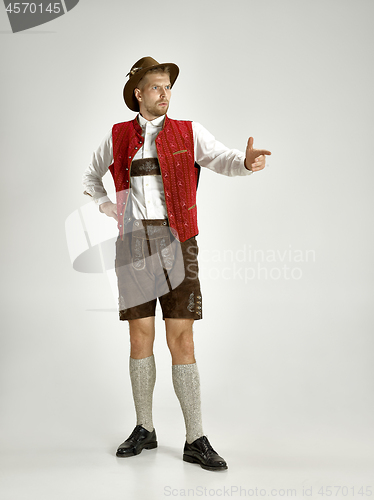 Image of Portrait of Oktoberfest man, wearing a traditional Bavarian clothes