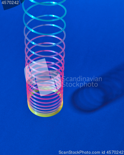 Image of Classic colored plastic spring hungs with shadow.