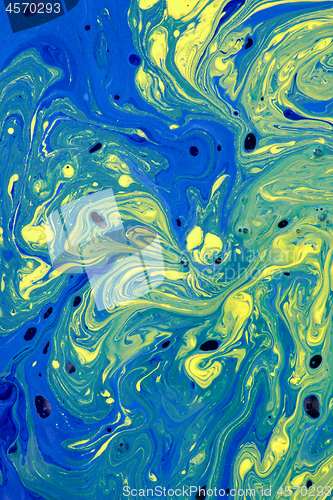 Image of Mixed acrylic paint background with a marble effect.