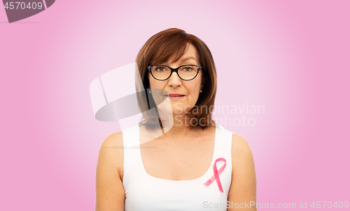 Image of old woman with pink breast cancer awareness ribbon