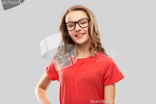 Image of smiling student girl in glasses and red t-shirt