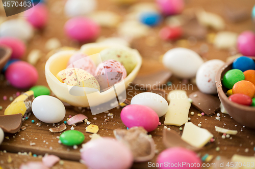 Image of chocolate easter eggs and candy drops on table