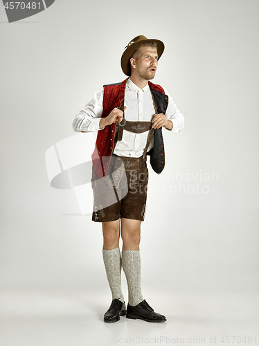 Image of Portrait of Oktoberfest man, wearing a traditional Bavarian clothes