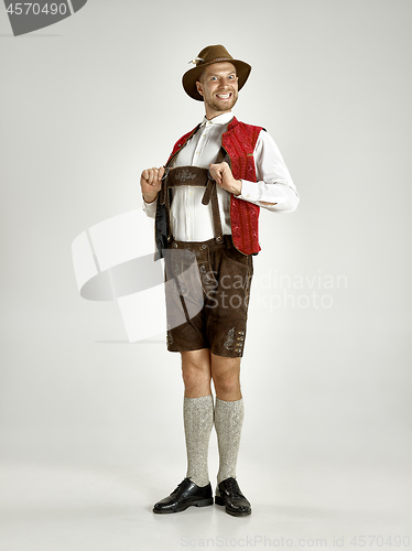 Image of Portrait of Oktoberfest man, wearing a traditional Bavarian clothes