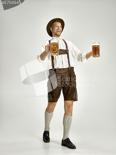 Image of Portrait of Oktoberfest man, wearing a traditional Bavarian clothes