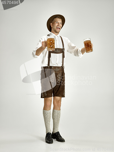 Image of Portrait of Oktoberfest man, wearing a traditional Bavarian clothes