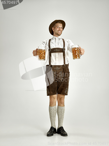 Image of Portrait of Oktoberfest man, wearing a traditional Bavarian clothes