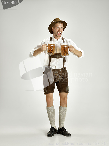 Image of Portrait of Oktoberfest man, wearing a traditional Bavarian clothes