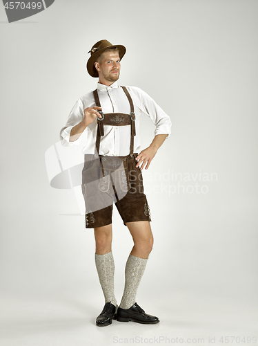 Image of Portrait of Oktoberfest man, wearing a traditional Bavarian clothes