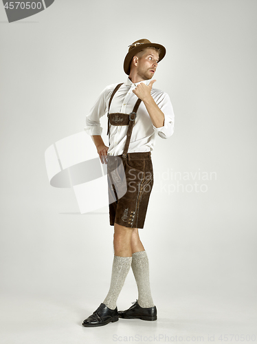 Image of Portrait of Oktoberfest man, wearing a traditional Bavarian clothes