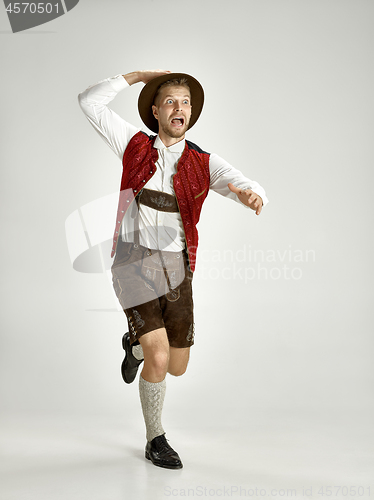 Image of Portrait of Oktoberfest man, wearing a traditional Bavarian clothes